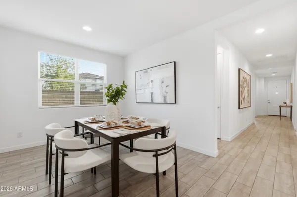a view of a dining room with furniture