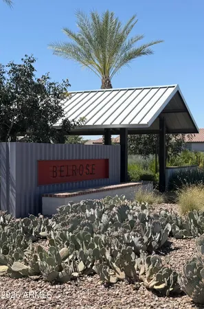 a view of a house with a small yard
