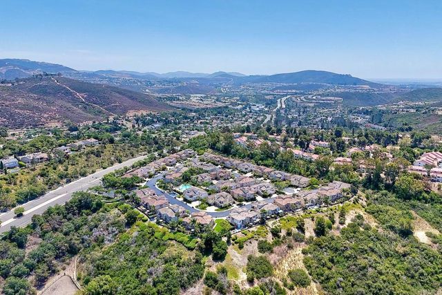 an aerial view of a city with lots of residential buildings