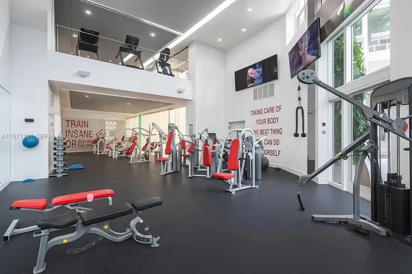 a view of a room with gym equipment
