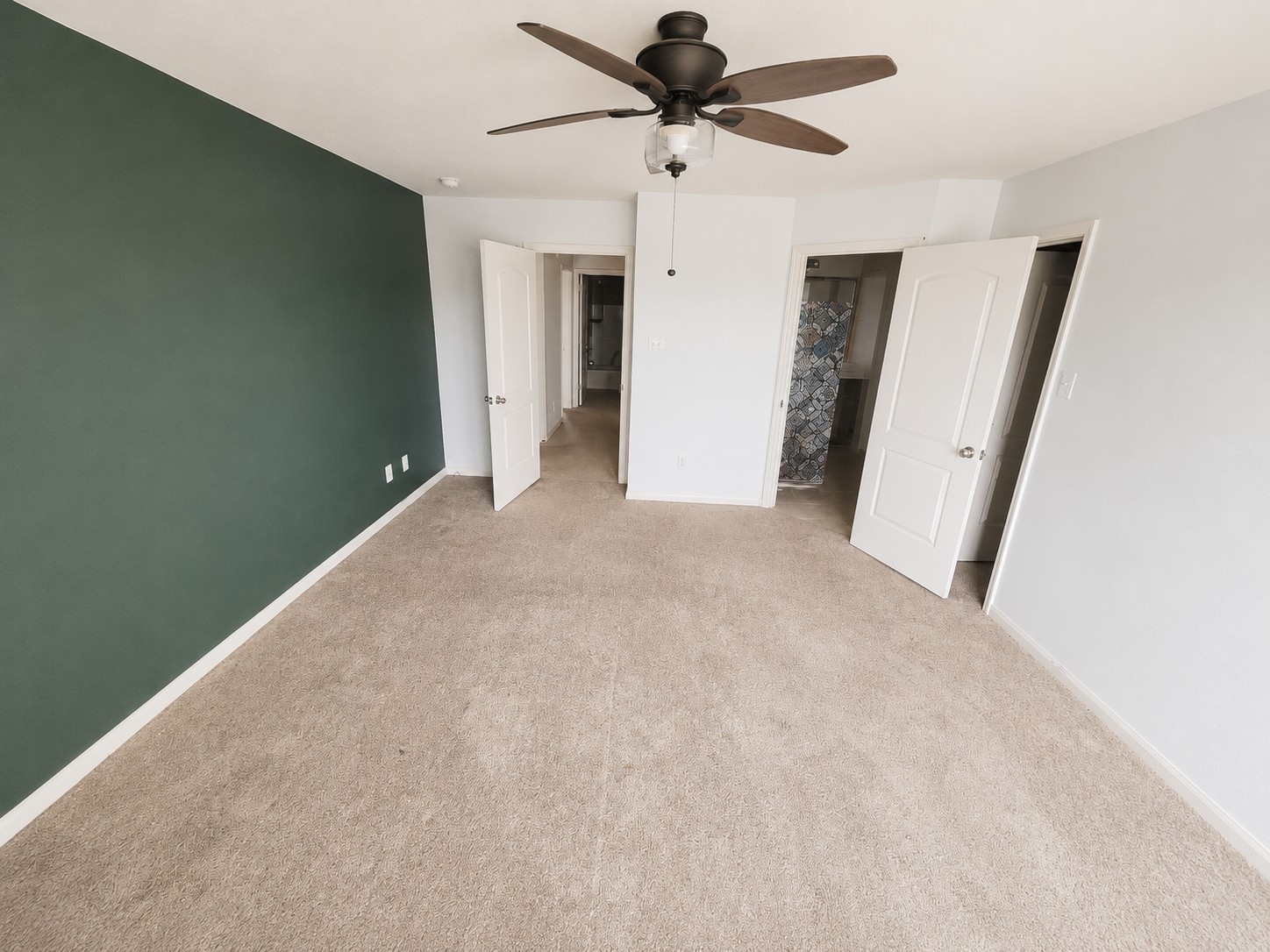 341 Comanche Plains Road La Marque, TX 77568 - Photo 9 of 17 a view of a big room with closet and a ceiling fan