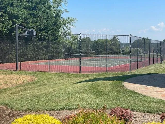 a view of swimming pool with a yard