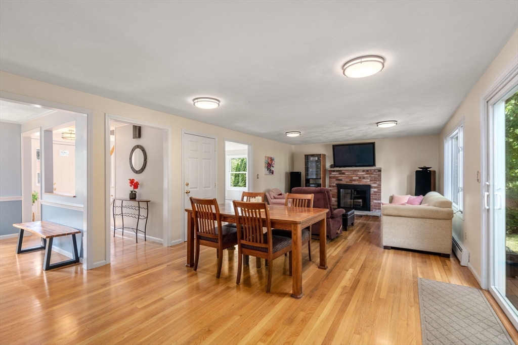 27 Prospect Avenue Arlington, MA 02476 - Photo 14 of 42 a view of a dining room with furniture window and wooden floor