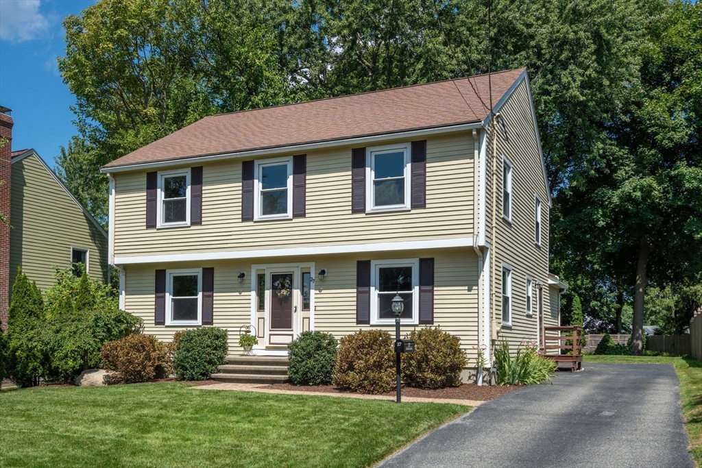 27 Prospect Avenue Arlington, MA 02476 - Photo 2 of 42 a front view of a house with a yard and porch