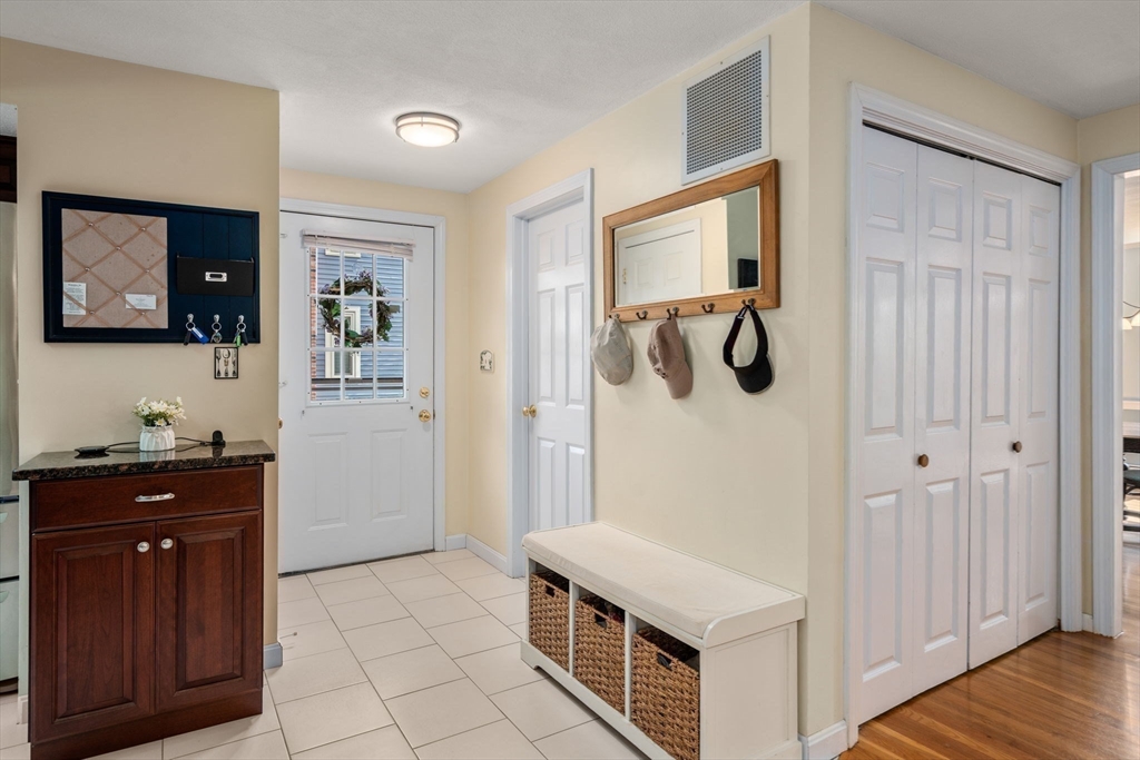27 Prospect Avenue Arlington, MA 02476 - Photo 22 of 42 a kitchen with a refrigerator and a sink