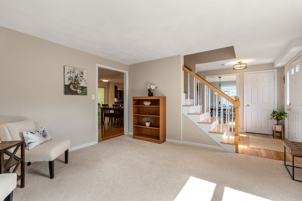 27 Prospect Avenue Arlington, MA 02476 - Photo 27 of 42 a view of a livingroom with furniture and staircase