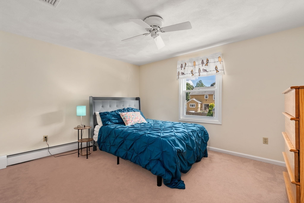 27 Prospect Avenue Arlington, MA 02476 - Photo 36 of 42 a bedroom with a bed dresser and a window