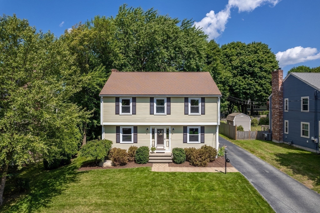 27 Prospect Avenue Arlington, MA 02476 - Photo 39 of 42 a front view of a house with a yard