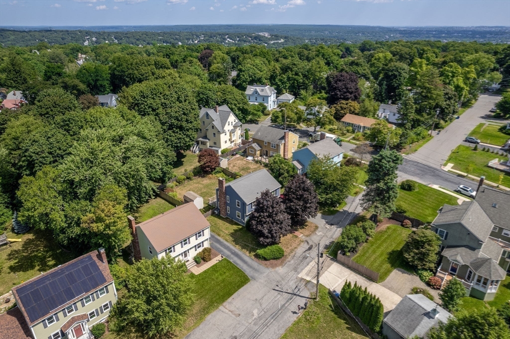 27 Prospect Avenue Arlington, MA 02476 - Photo 41 of 42 an aerial view of a house with a yard