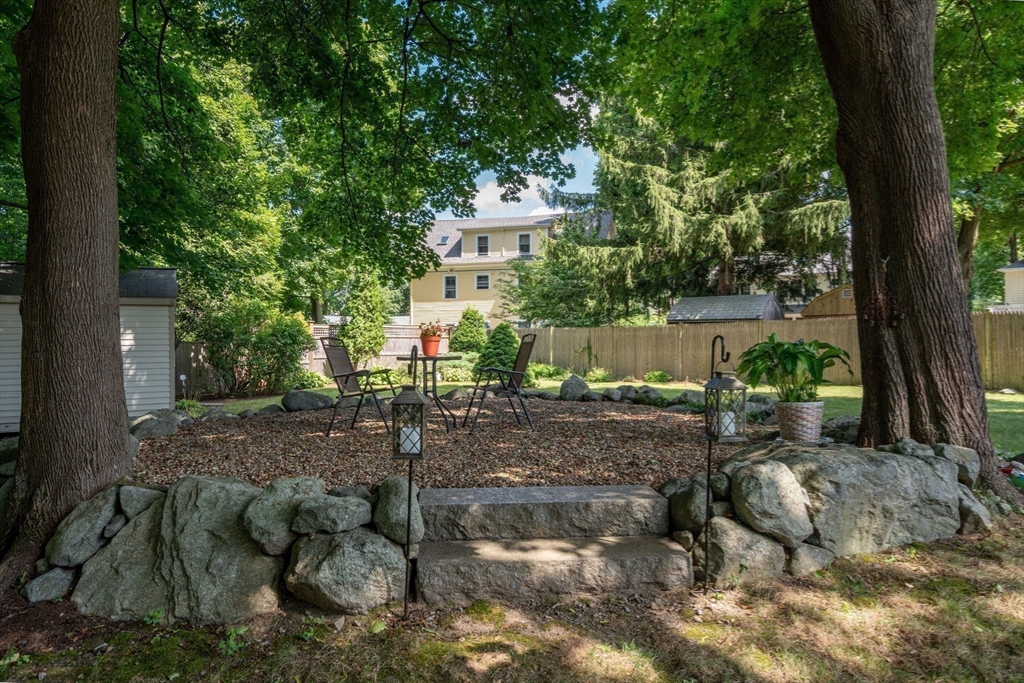 27 Prospect Avenue Arlington, MA 02476 - Photo 8 of 42 a view of a house with a yard and large tree