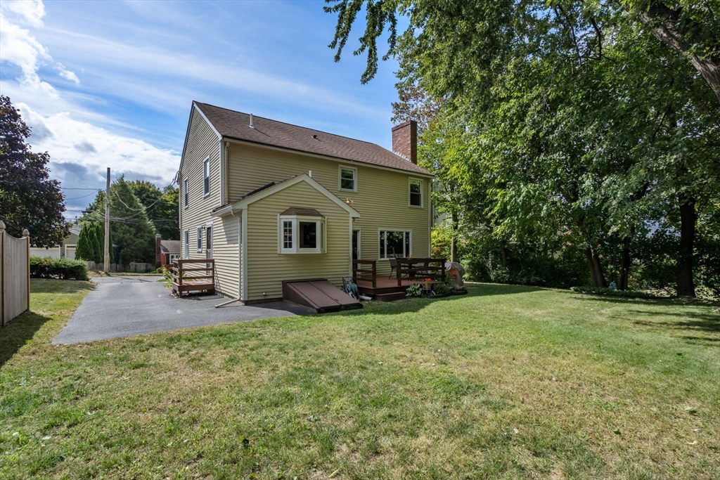 27 Prospect Avenue Arlington, MA 02476 - Photo 10 of 42 a view of a house with backyard porch and garden