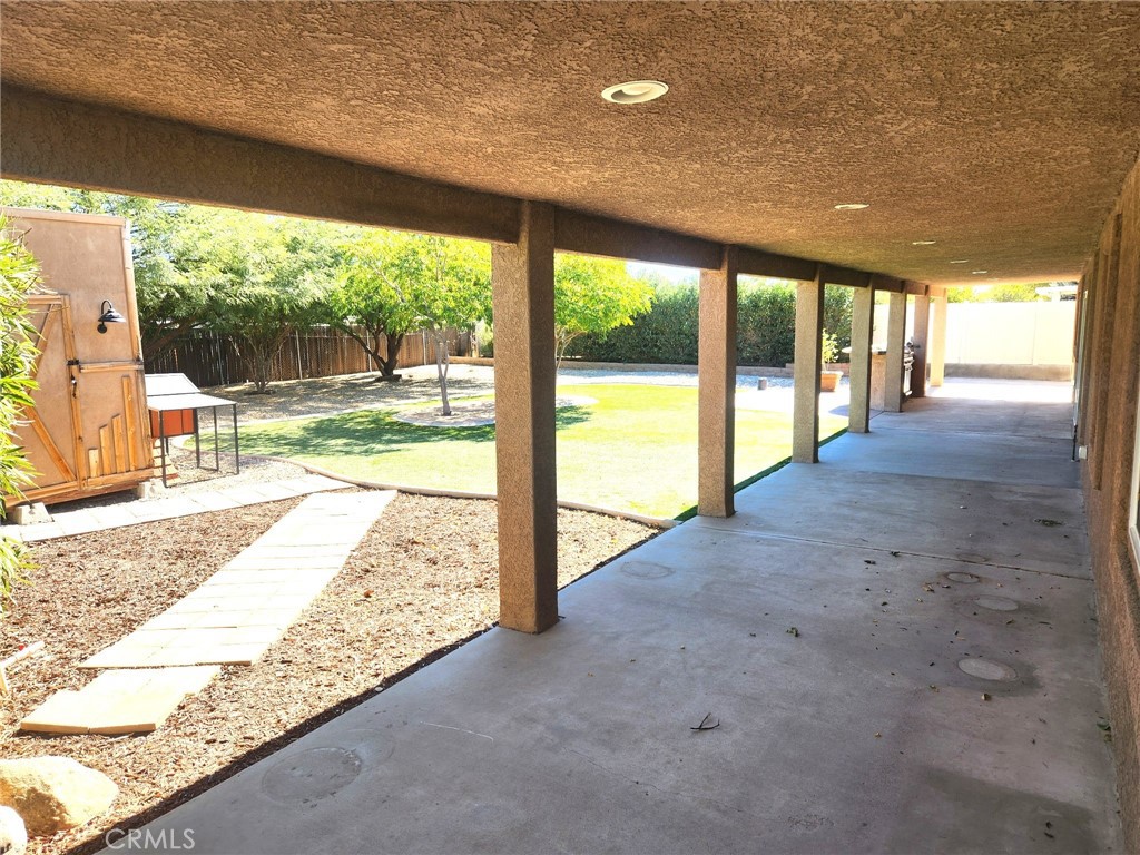 13237 Heritage Drive Victorville, CA 92392 - Photo 18 of 21 a view of an empty room with large windows