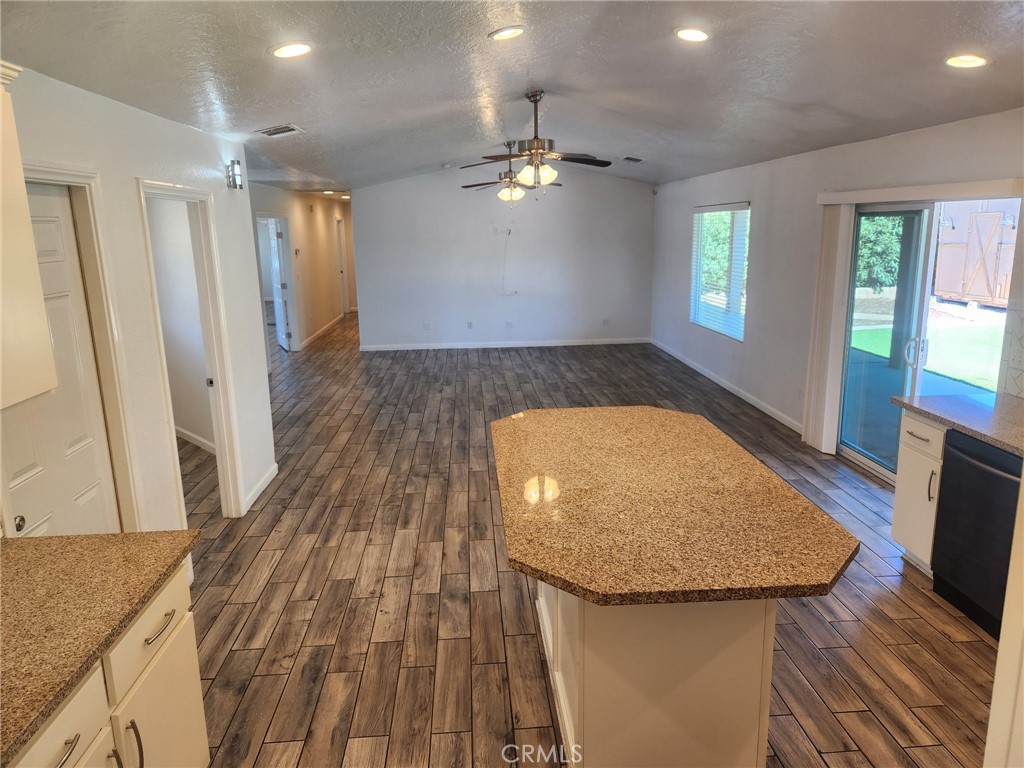 13237 Heritage Drive Victorville, CA 92392 - Photo 8 of 21 a view of a kitchen with a sink and wooden floor