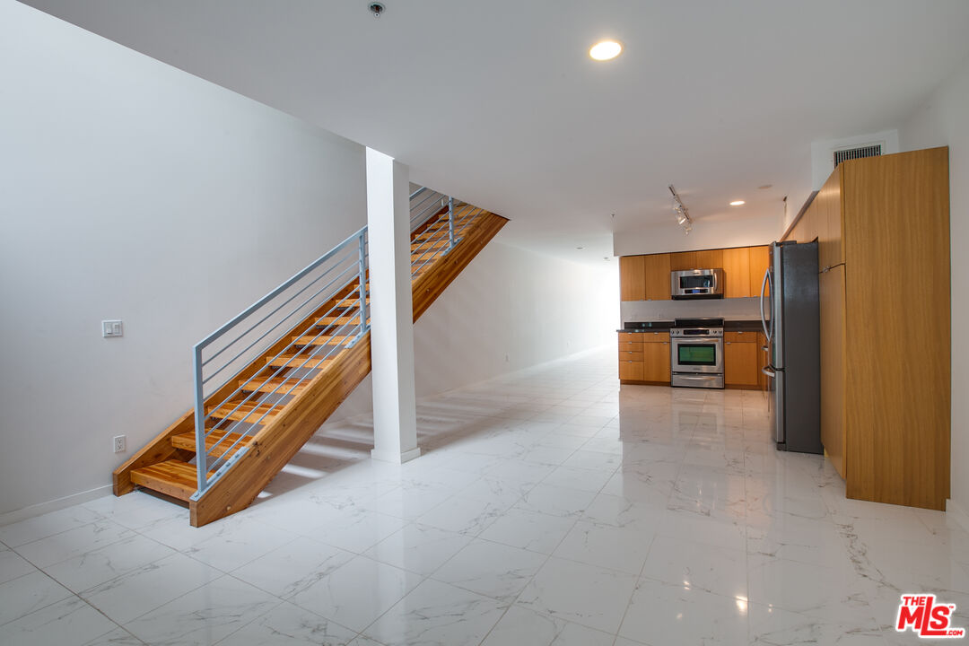 700 Main Street, Unit 5 Venice, CA 90291 - Photo 1 of 28 a view of livingroom with furniture and a ceiling fan