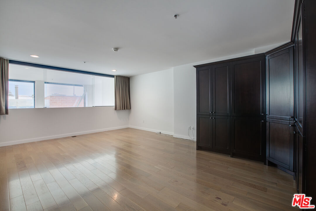 700 Main Street, Unit 5 Venice, CA 90291 - Photo 16 of 28 a view of an empty room with wooden floor