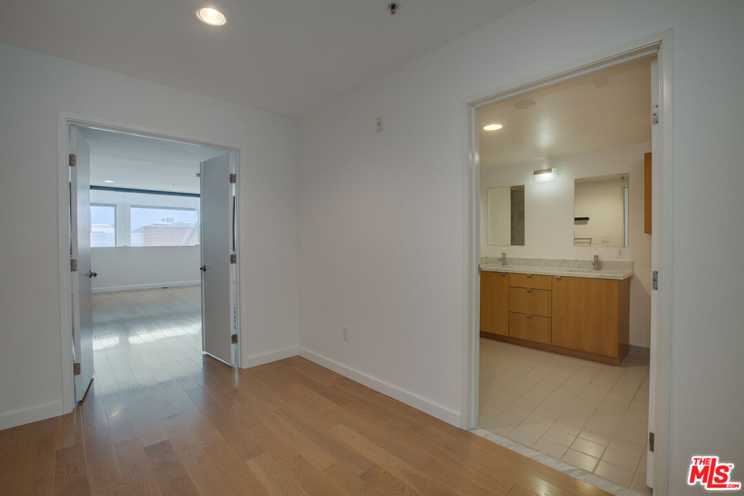 700 Main Street, Unit 5 Venice, CA 90291 - Photo 20 of 28 a view of a bathroom with sink and mirror