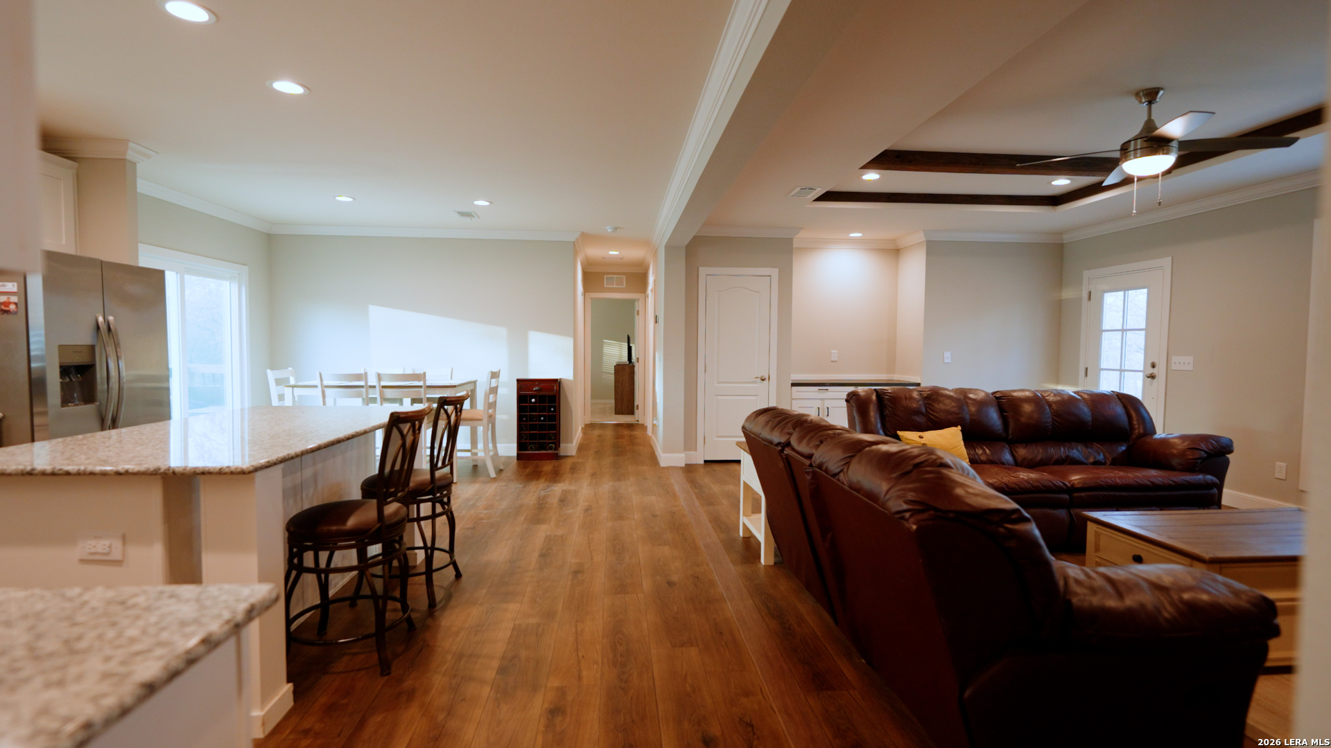 1440 Nockenut Road Seguin, TX 78155 - Photo 4 of 34 a living room with furniture and a wooden floor