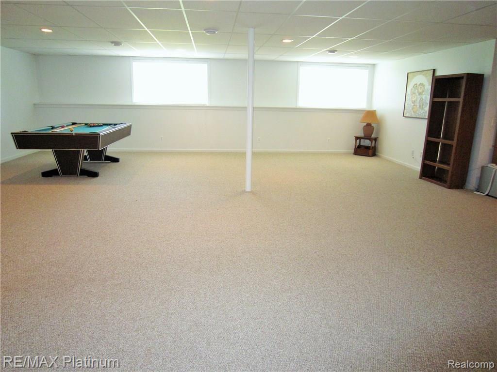 7011 Oak Grove Road Howell, MI 48855 - Photo 20 of 30 Finished daylight lower level family room