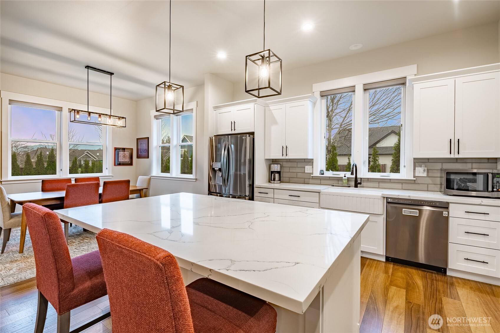 2202 Berryman Loop Lynden, WA 98264 - Photo 15 of 39 a large kitchen with a table and chairs
