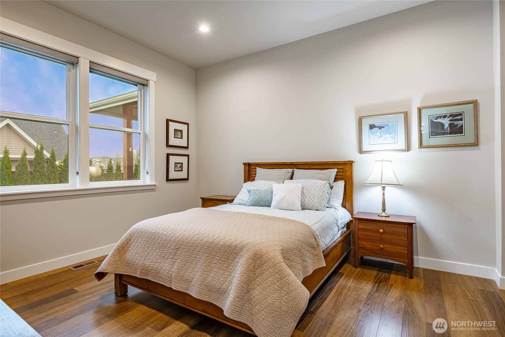 2202 Berryman Loop Lynden, WA 98264 - Photo 19 of 39 a bedroom with a bed and wooden floor