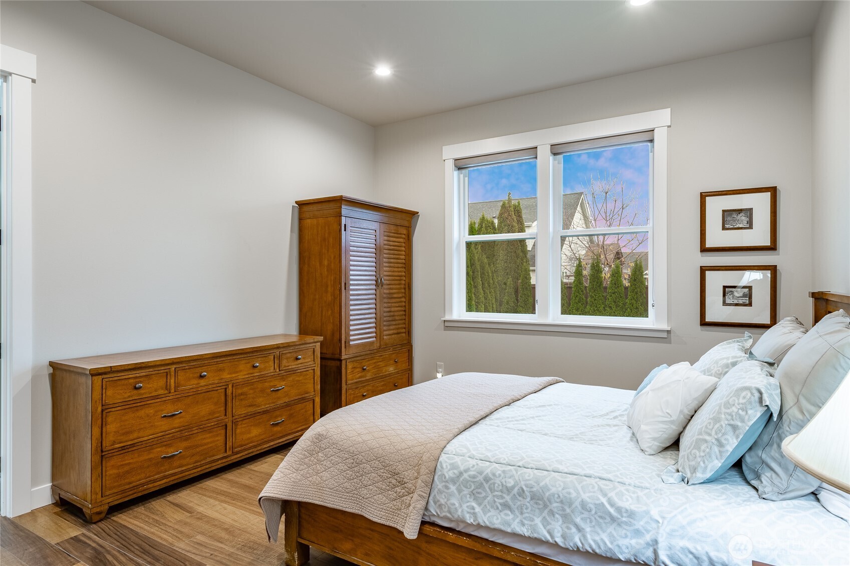 2202 Berryman Loop Lynden, WA 98264 - Photo 20 of 39 a bedroom with a bed and a dresser
