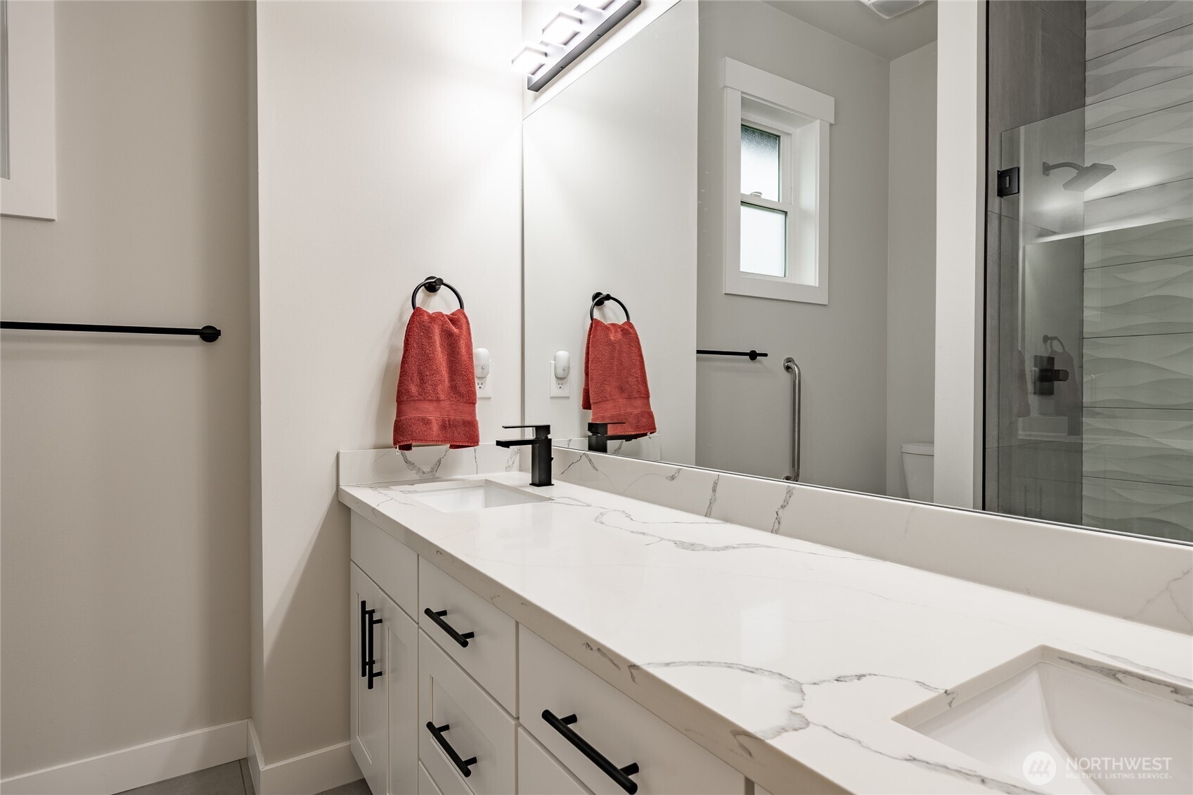 2202 Berryman Loop Lynden, WA 98264 - Photo 28 of 39 a bathroom with a sink vanity and a mirror