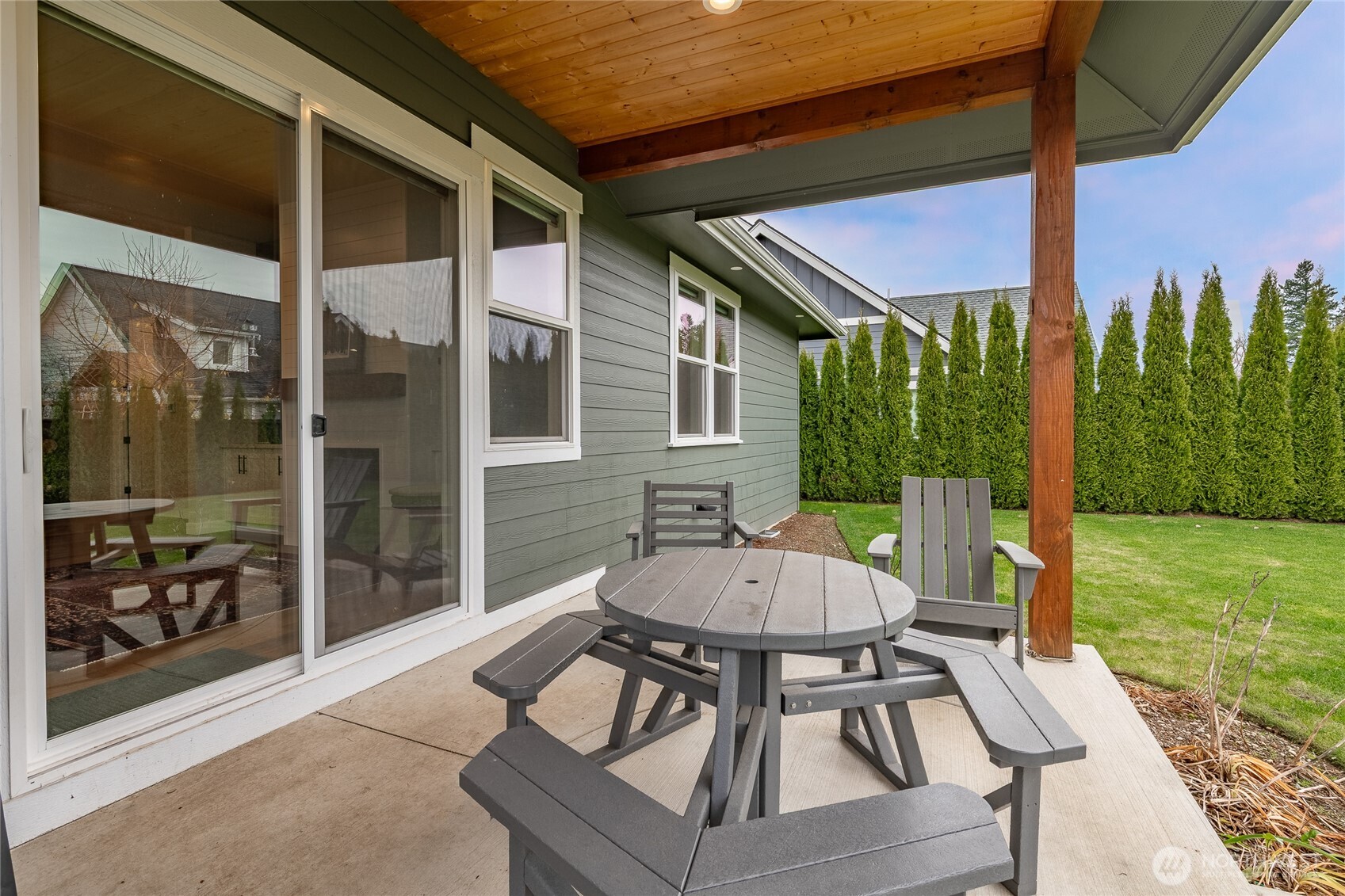 2202 Berryman Loop Lynden, WA 98264 - Photo 36 of 39 a view of an outdoor dining space with a table and chairs