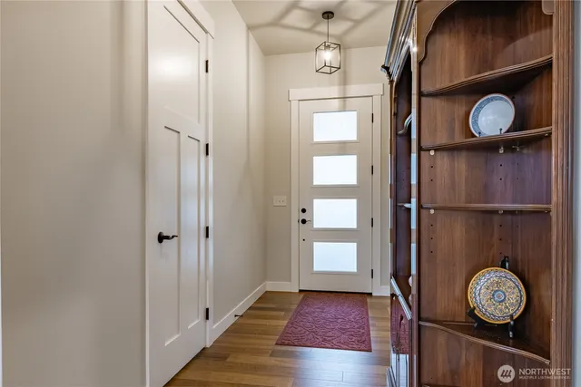 a view of entryway with wooden floor