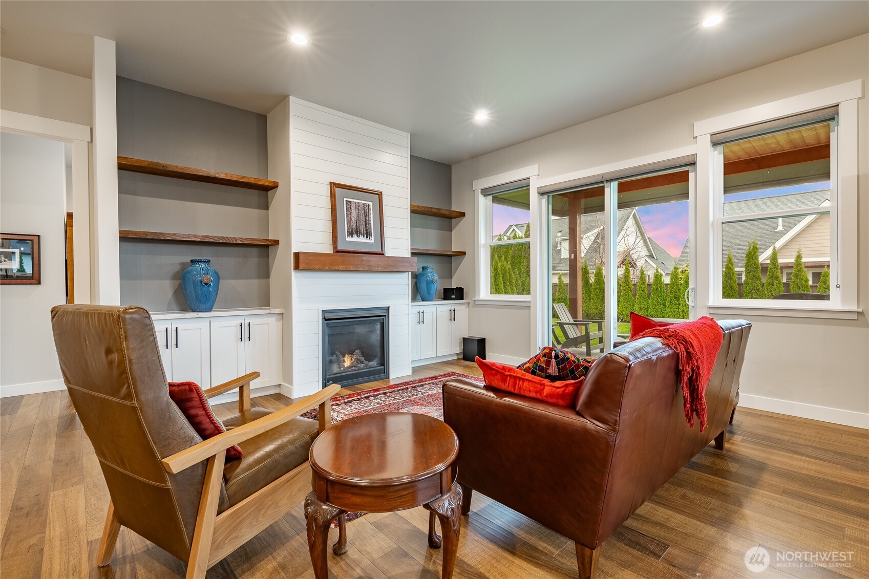 2202 Berryman Loop Lynden, WA 98264 - Photo 6 of 39 a living room with furniture a fireplace and windows