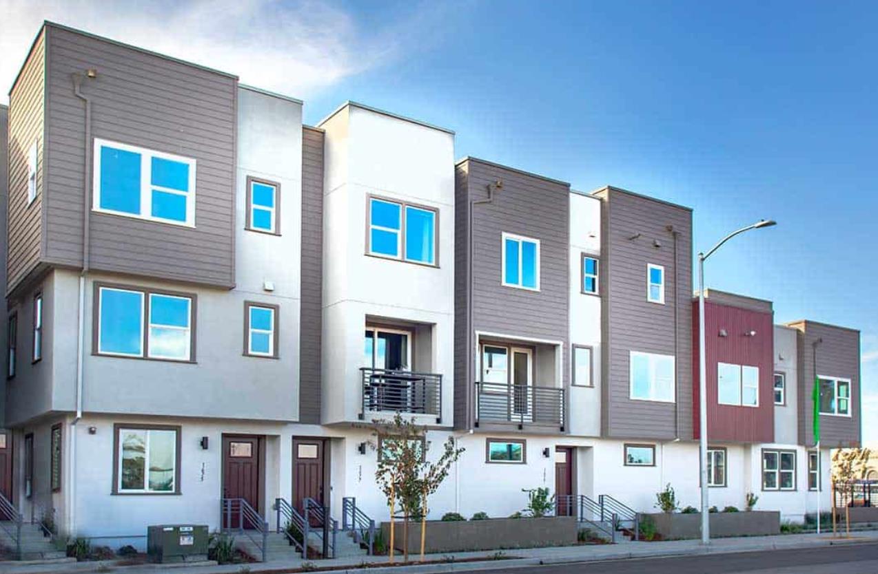 a front view of a multi story residential apartment building