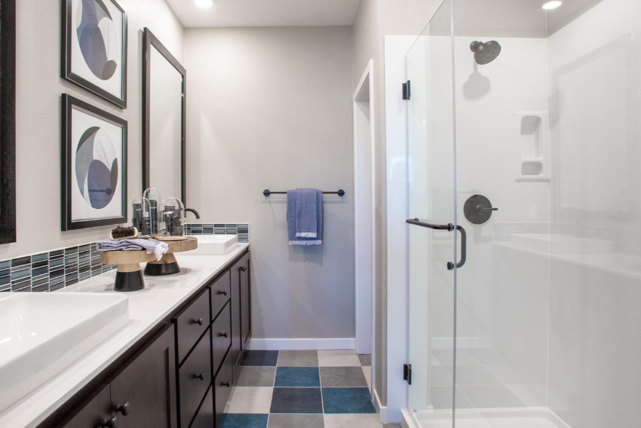 1755 Railway Circle Oakland, CA 94607 - Photo 4 of 6 a bathroom with a double vanity sink mirror and shower