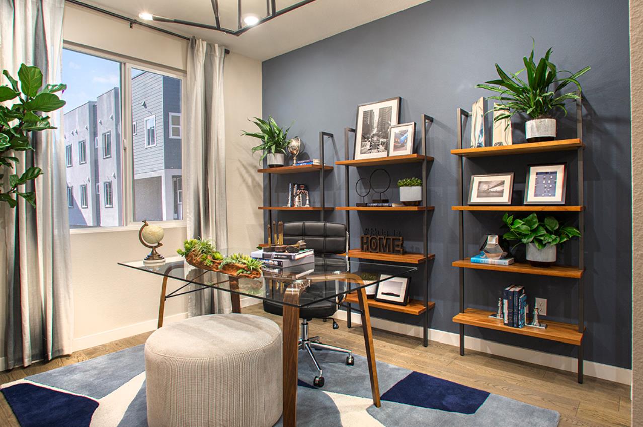 1755 Railway Circle Oakland, CA 94607 - Photo 6 of 6 a living room with furniture and a potted plant
