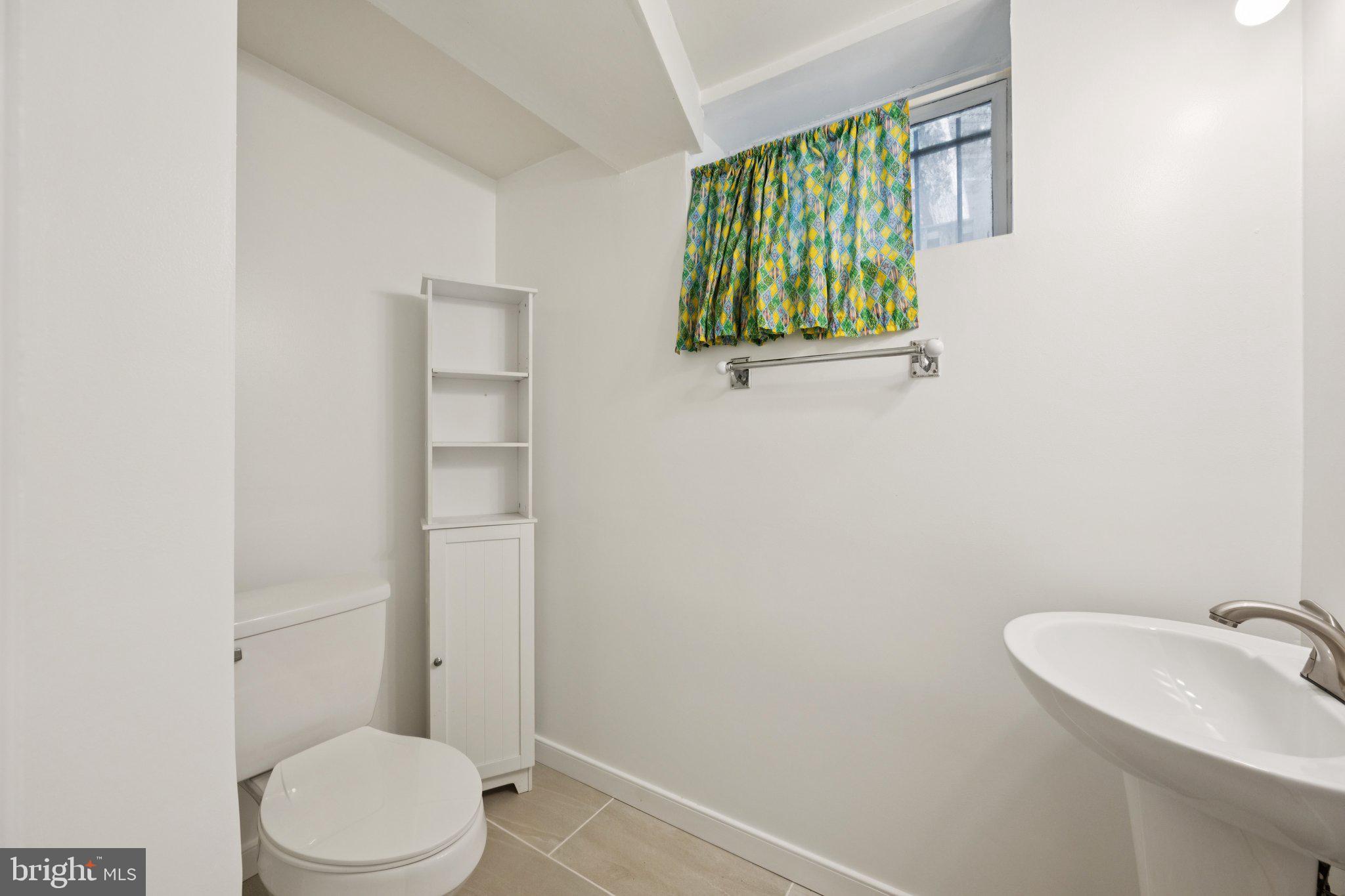 4329 H Street Southeast Washington, DC 20019 - Photo 27 of 34 Lower level half-bath remodeled in 2024