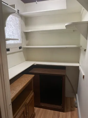 a cabinet with a grey cabinets