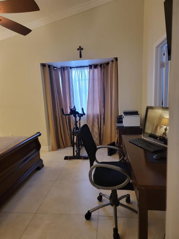 11821 Southwest 18th Street, Unit 223 Miami, FL 33175 - Photo 28 of 31 a room with furniture and musical instruments