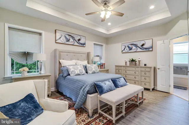 a bedroom with furniture and a window