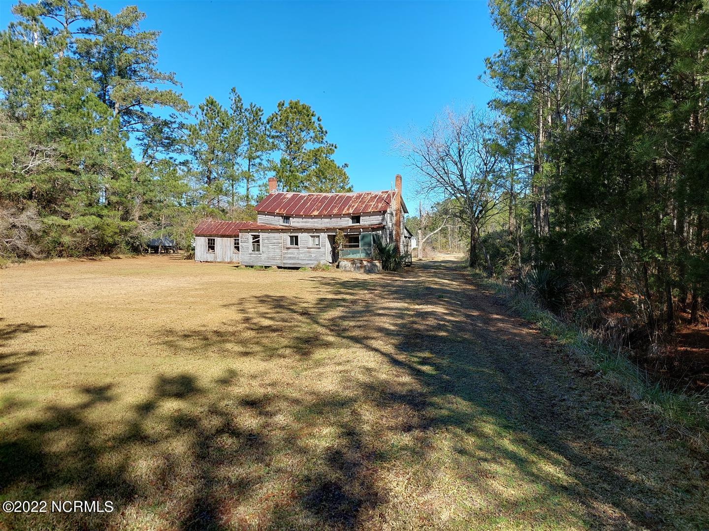 328 Meekins Road Bayboro, NC 28515 - Photo 14 of 18 Back of Farm House near Main Road