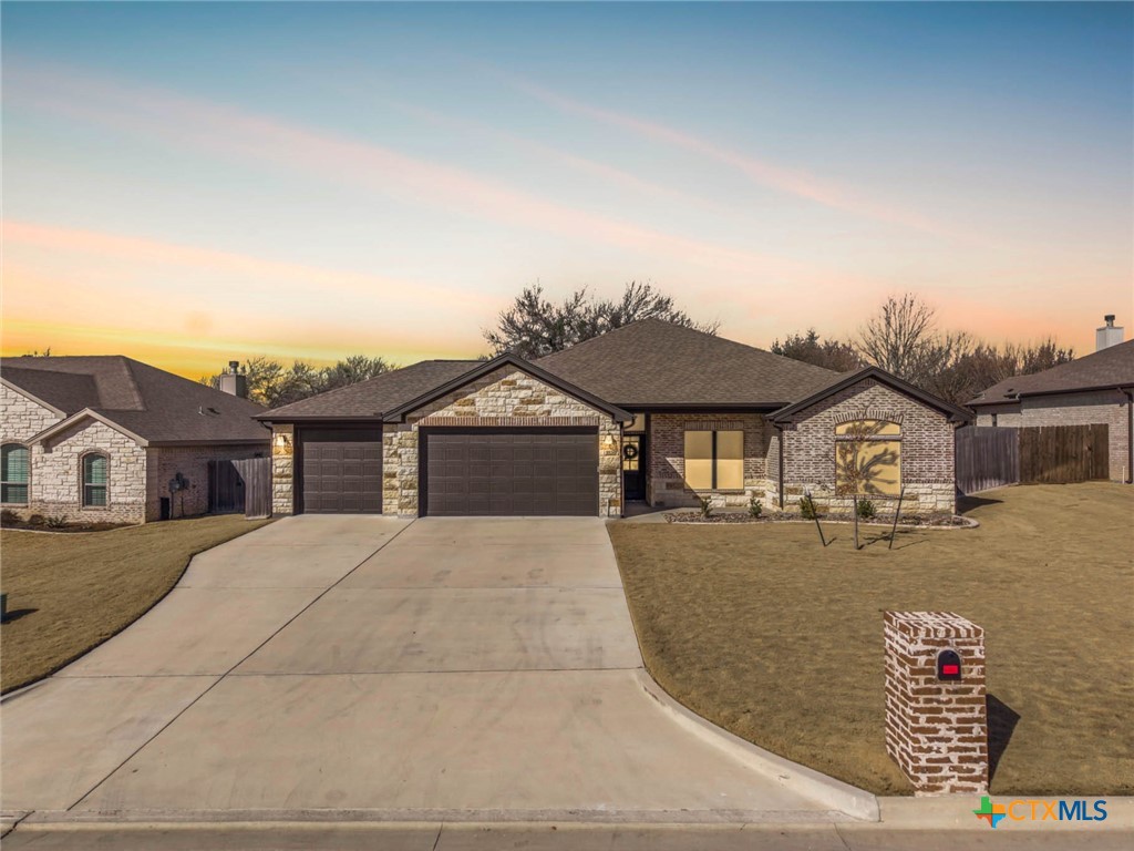 3526 Leaning Tree Cove Belton, TX 76513 - Photo 1 of 1 a front view of a house with a yard