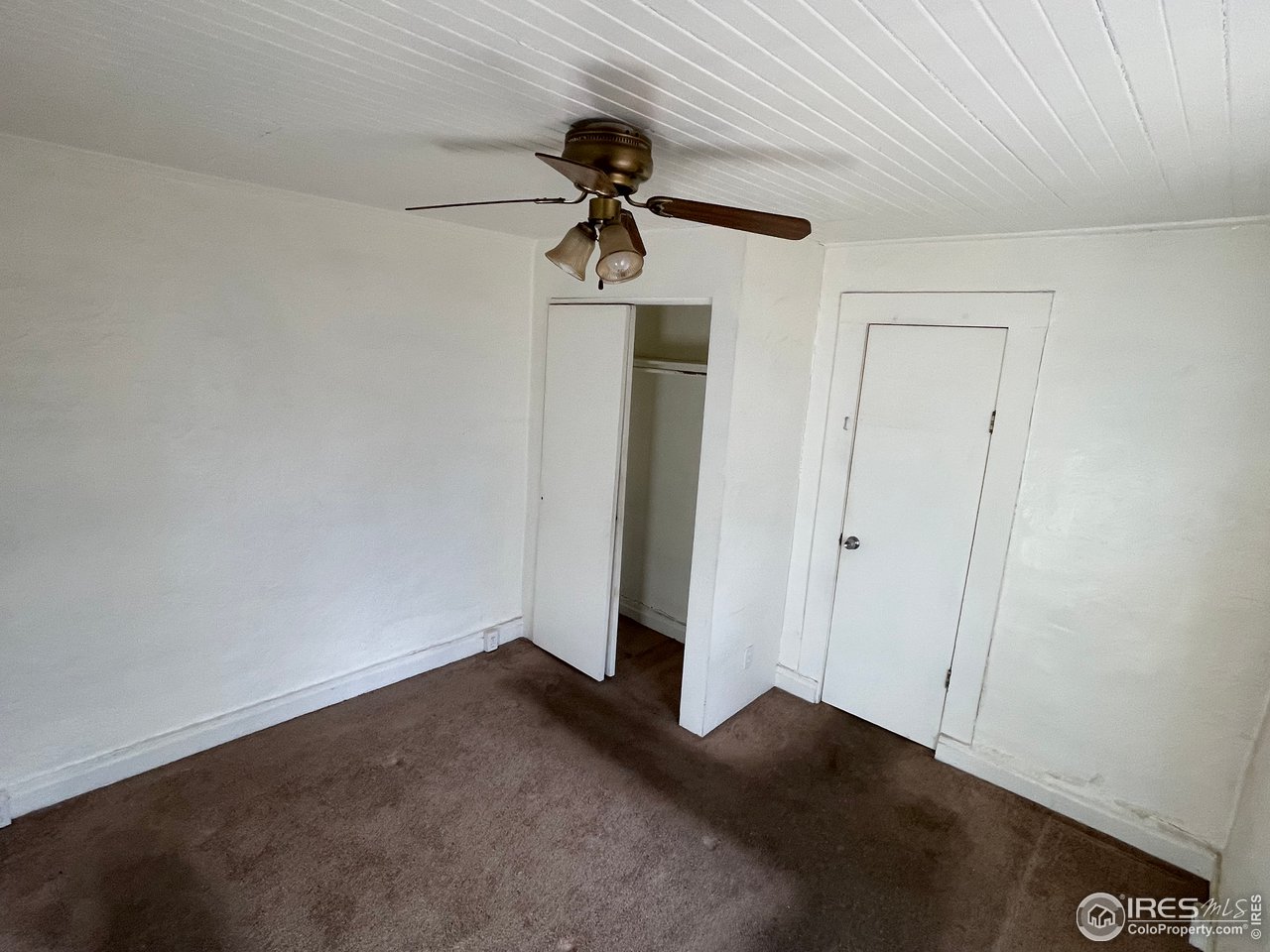 101 Reed Place Longmont, CO 80504 - Photo 20 of 34 a view of empty room with ceiling fan