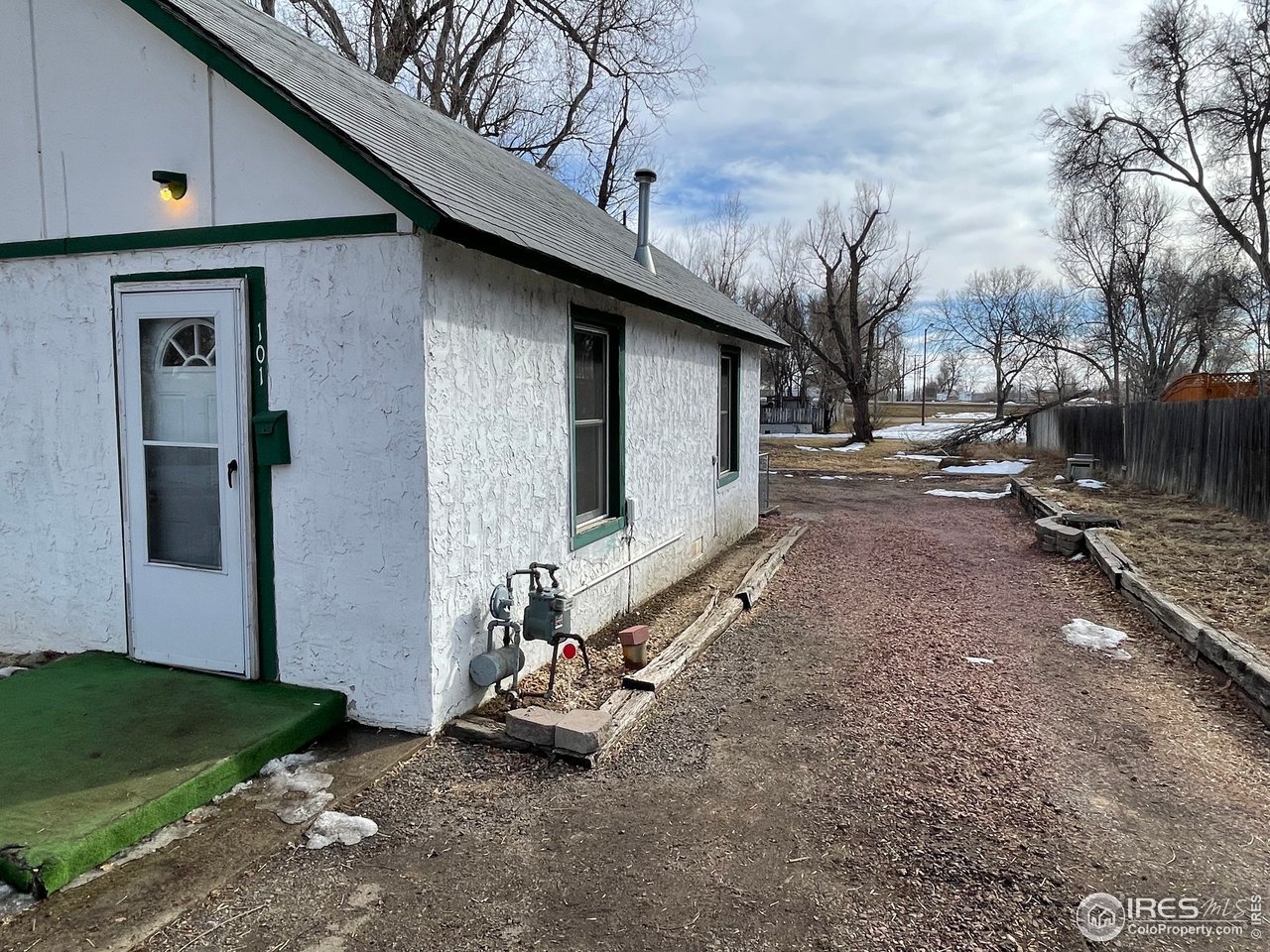 101 Reed Place Longmont, CO 80504 - Photo 2 of 34 a view of a house with a yard