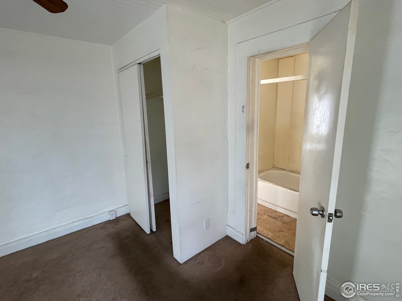101 Reed Place Longmont, CO 80504 - Photo 21 of 34 an empty room with windows