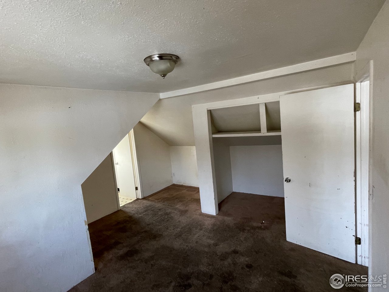 101 Reed Place Longmont, CO 80504 - Photo 27 of 34 a view of an empty room with closet