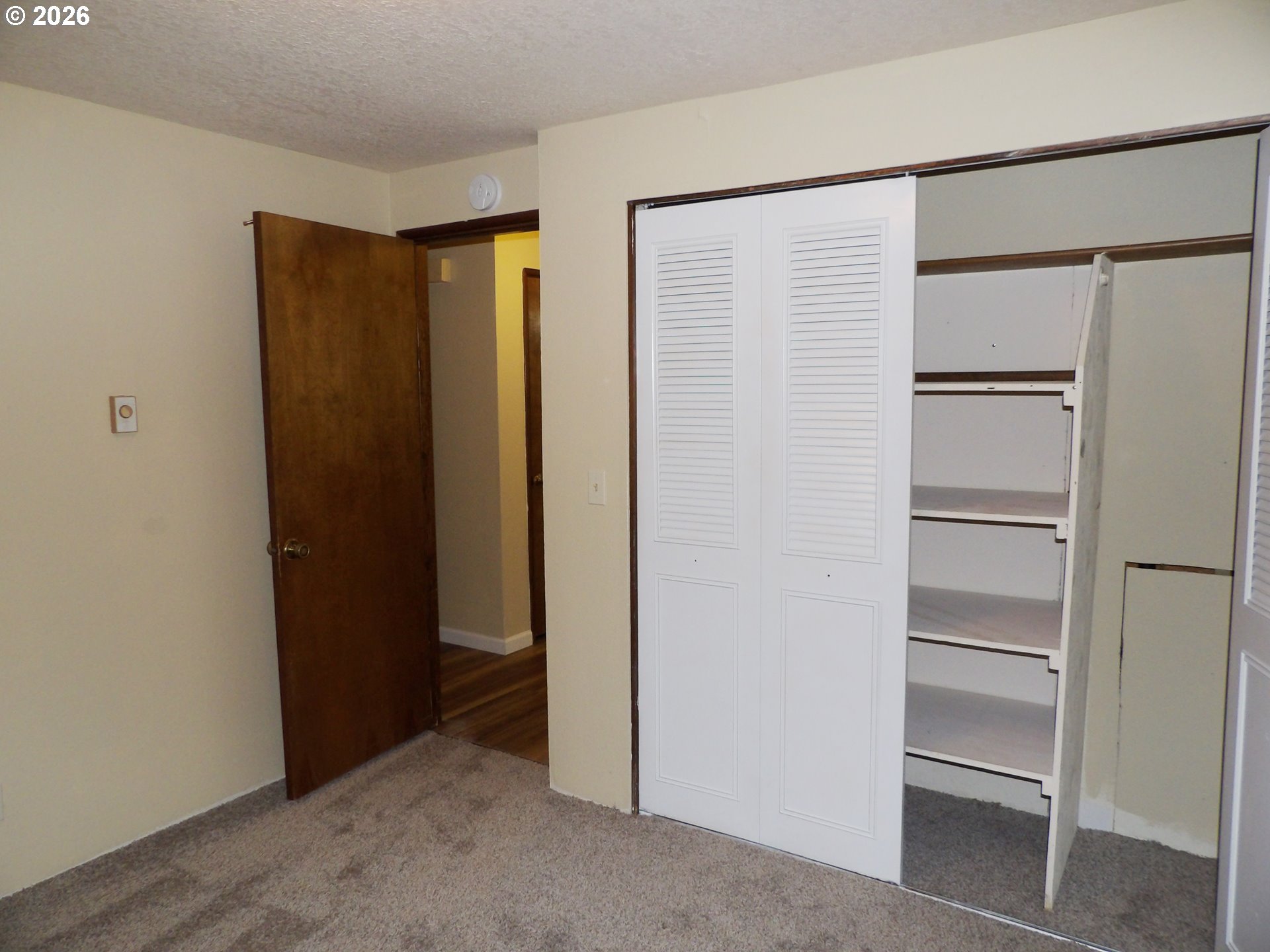 3124 19th Place Forest Grove, OR 97116 - Photo 26 of 31 a view of an empty room with a closet