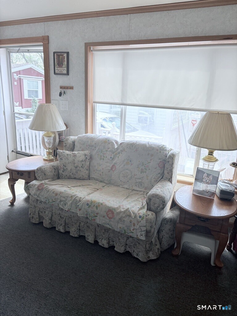 62 Fort Hill Road Groton, CT 06340 - Photo 7 of 11 a living room with furniture and a window
