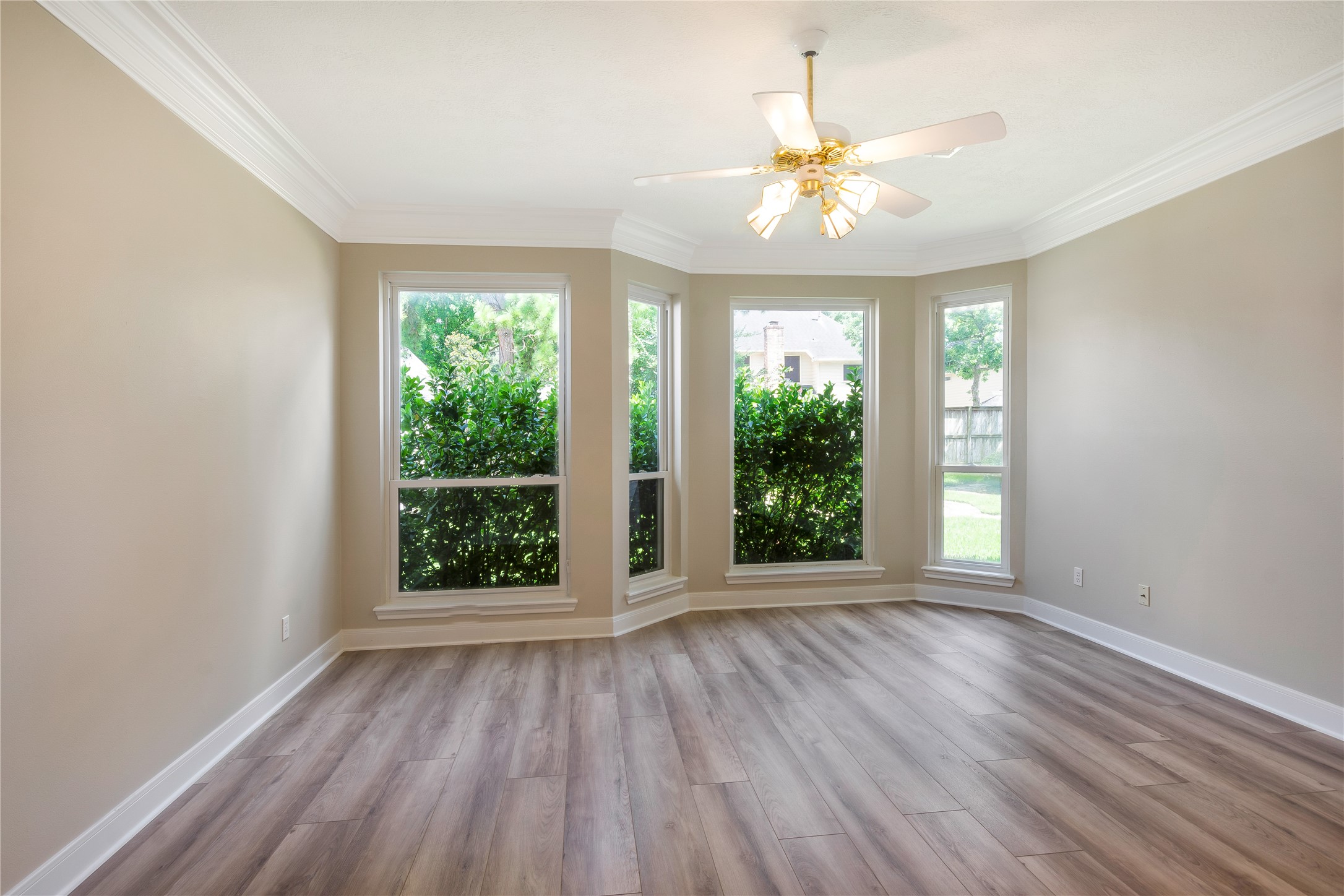 8011 Null Court Spring, TX 77379 - Photo 22 of 41 Primary bedroom with a beautiful view on the backyard.