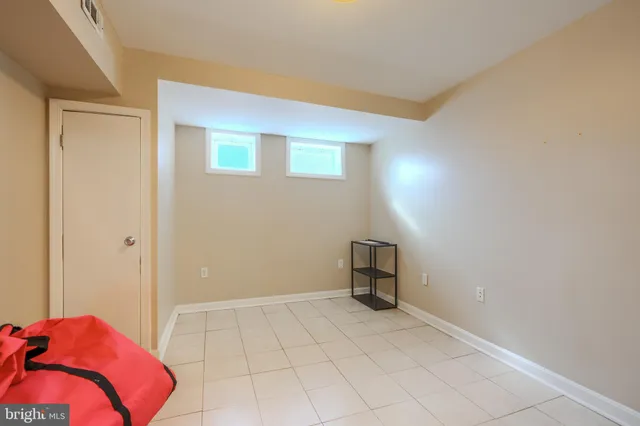 a view of a livingroom with a lounge chair