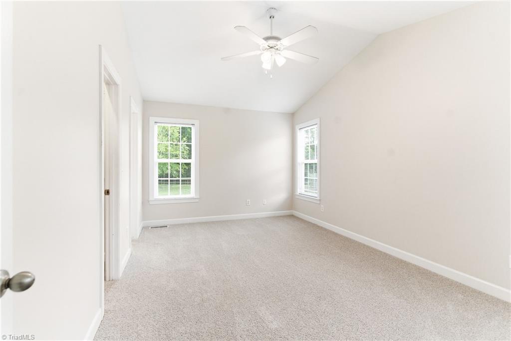 6232 Nat Road Julian, NC 27283 - Photo 19 of 28 Smooth-top electric stove with built-in microwave above