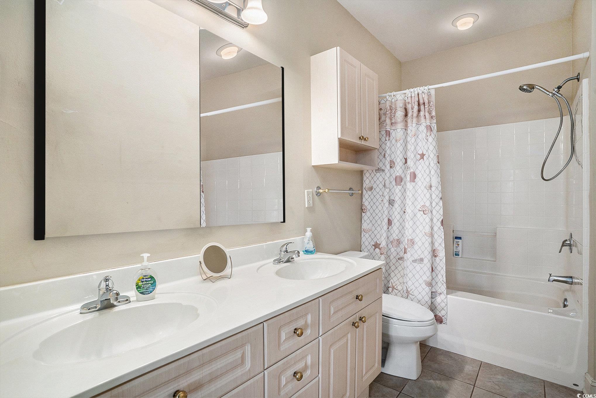 4895 Luster Leaf Circle, Unit 302 Myrtle Beach, SC 29577 - Photo 10 of 20 Mirror in bathroom is virtually staged. New mirror