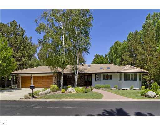 2501 Lake Ridge Reno, NV 89519 - Photo 1 of 25 a front view of a house with a garden