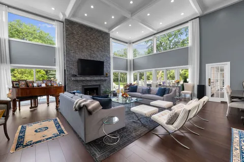 a kitchen with stainless steel appliances granite countertop a stove and a large refrigerator